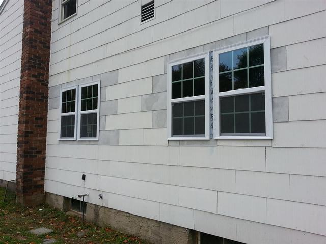 85:  The new windows look much much better than the old ones. But with the upcoming kitchen renovation, I'm not going to bother doing any sheetrock or moulding yet. In fact, I didnt even spray foam yes, since I wanted to inspect for leaks during the big storm. Looking back, it certainly was one hell of a first test, as the storm was bad enough to put 90% of long island back into the stone age.