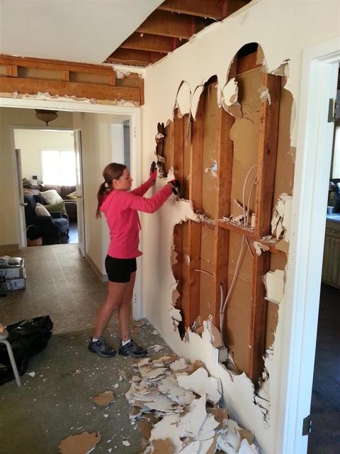 90:  My beautiful wife finally got to put her matching pink hoodie, pink workgloves and pink sledge hammer to the test.