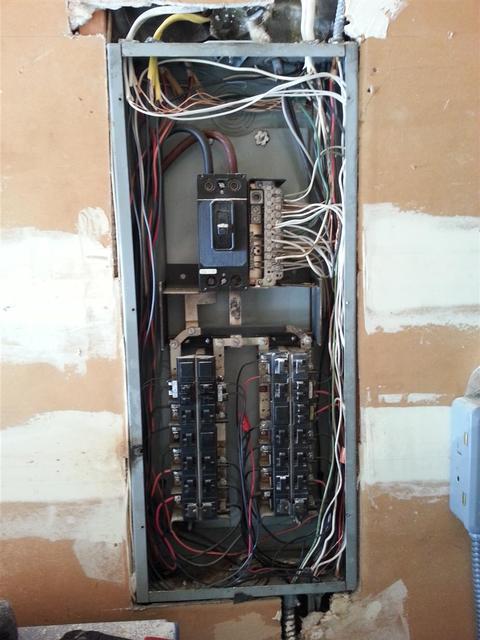 160: Our old ass pushmatic service panel gets the replacement kitchen circuits and two new double pole breakers.  Found a few loose grounds while I was in there too.