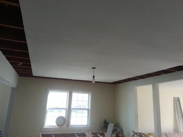 172: We trimmed back the sheetrock in the ceiling where the dropped tray ceiling will go.