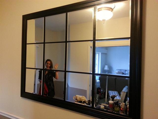 197: We built this mirror to mimic a piece that Lauren fell in love with at a house we saw while we were still house hunting.  She's been after me for months to finally get around to putting it together.  We just finished it up last night.