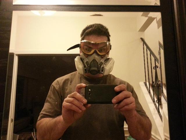 226: You dont want to take any chances breathing in the dust from the old tile and adhesive, so its a full respirator and goggles for me!