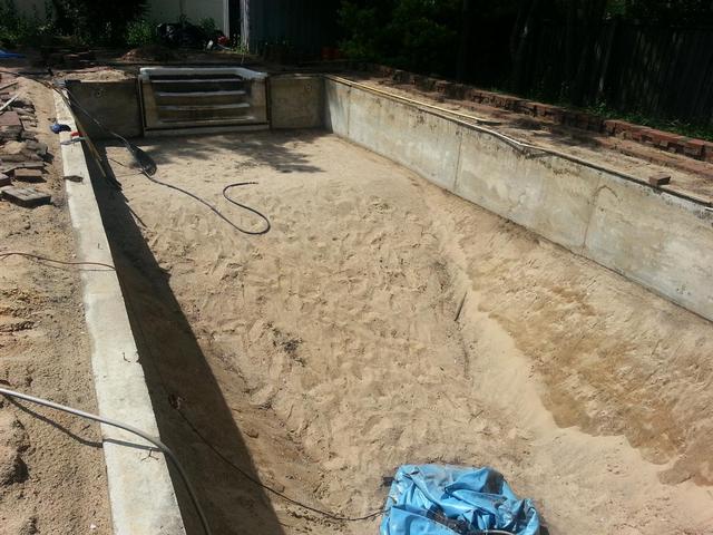 243: Quite a bit of re-grading needs to be done on the slopes.  Ill have to wait for a rainy day comes along to saturate the sand before I can retrowel it back up the sides.