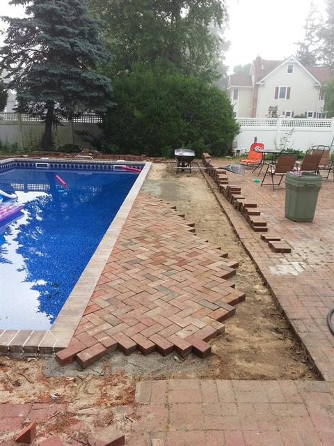 284: We started pulling up the existing pavers, cleaning off the moss, and re-setting them in a new herringbone pattern.  This requires an awful lot of cuts.  Its a lot of hard labor, and it goes MUCH slower than I thought it would.  We're on track to finish this by 2017.