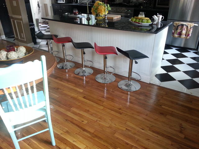 290: Here's the finished floor.  Nice to have the mouldings back on, even if they do need to be filled and painted.  Overall, I'm happy with the way the floors turned out, and I really didnt think the floors had much life left in them when we first uncovered them.  But honestly, it wasn't much cheaper or less work than simply replacing the floors with new pre-finished wood.  I'll have to weigh my options when it comes to refinishing upstairs.