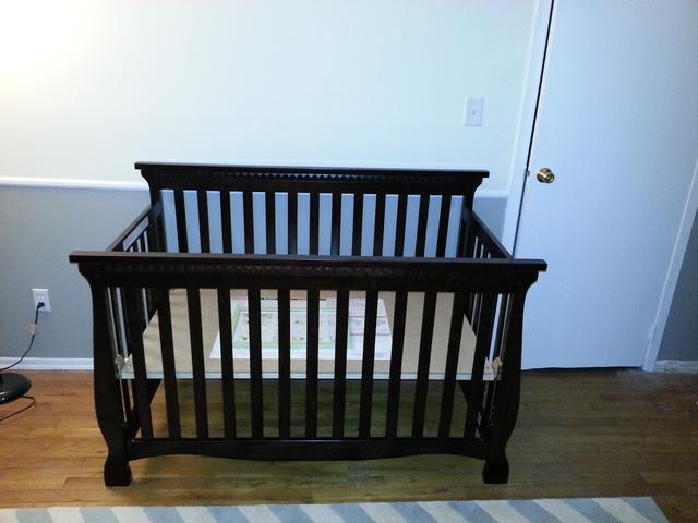 351: We assembled the crib.  It converts into a toddler bed with an open front, and after that you can convert it to a twin size bed as he grows.  Thanks to James and Amanda for the suggestion.