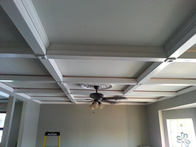 361: With all the base moulding in place, we can start with the 2-1/2 crown moulding to finish each square.  This was my first test cut, so the angles are a bit off.  Once I dial them in, I will re-do the crown in this first square, but I was running out of steam for the night.