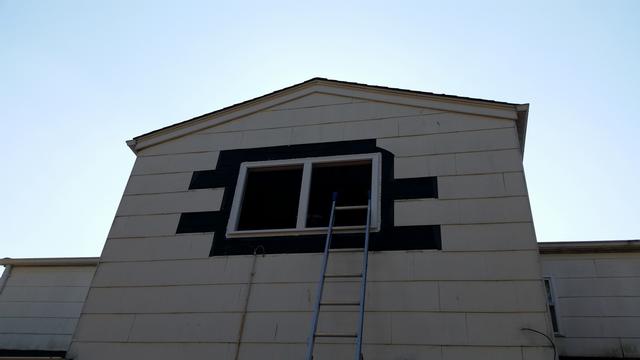 373: We could then reinstall the sashes, and screw in the remaining perimeter holes.  Next up, some flashing, and on to cutting an dhanging new cement fiber shingles.
