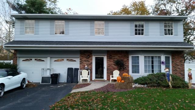 375: Now for the grand finale - replacing the front bedroom windows.  In preparation, we pulled all the shutters down and removed the storm windows.  They were barely out 10 minutes before scrappers were at the door asking if they could take them.  Saves me from lugging them out to the curb.