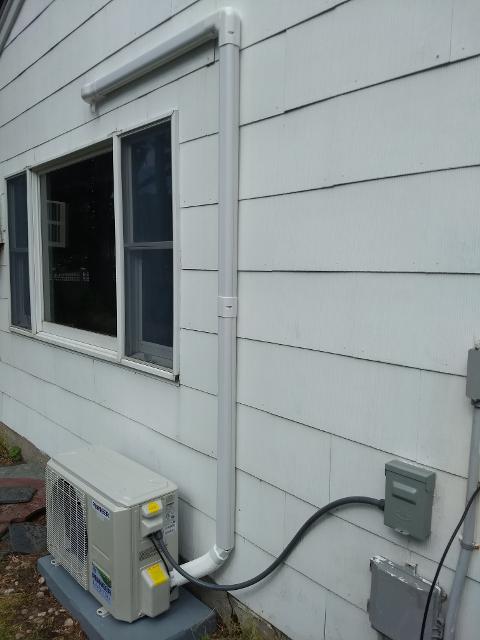385: Here's the 12K BTU outdoor unit for the den.   The master bedroom gets a matching unit as well.