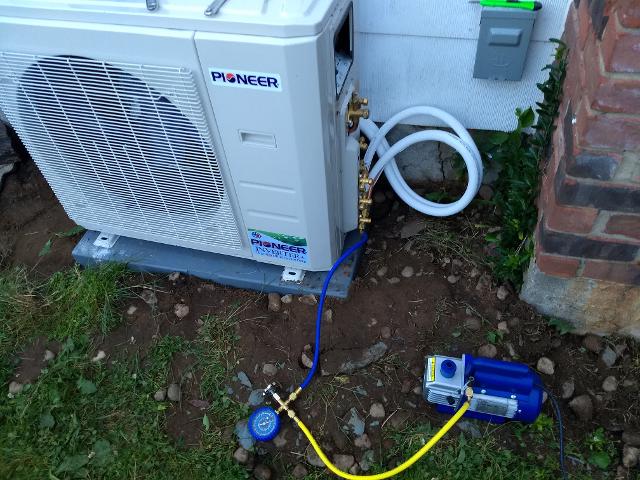 387: First zone is in.  Using the vacuum pump to evacuate the lineset before releasing the refrigerant.